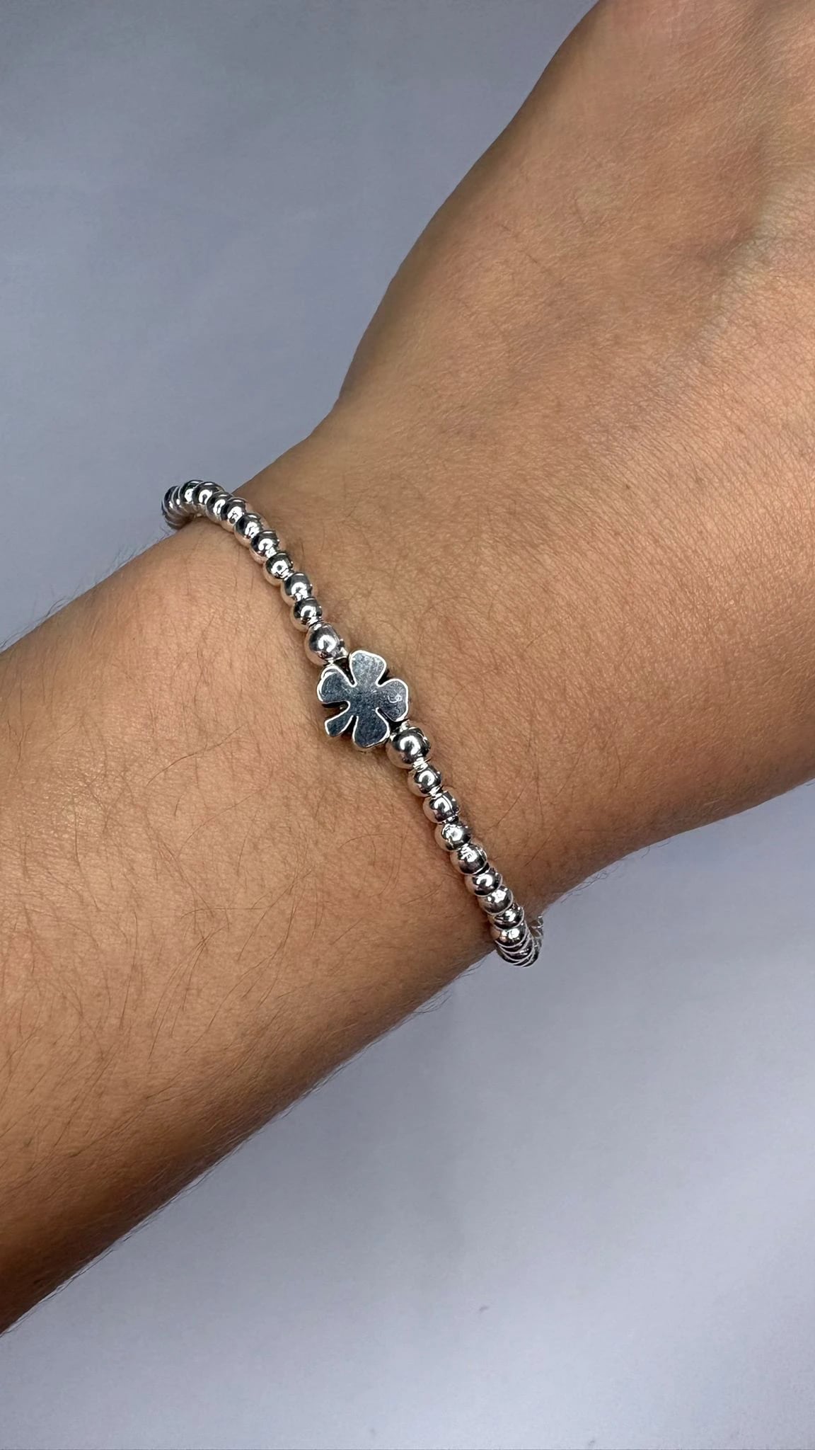 Pulse Bolitas con Dije Trébol